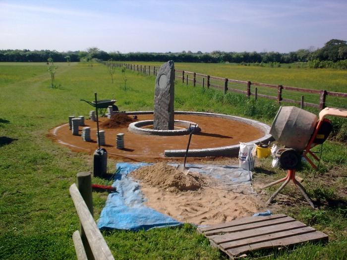 The outer circle of setts being laid