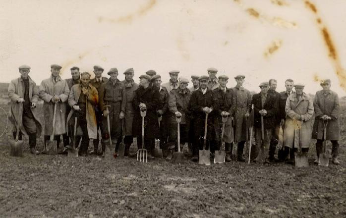 Golf greens workers