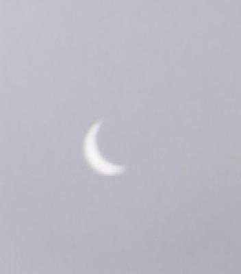 Partial solar eclipse through pin-hole projection