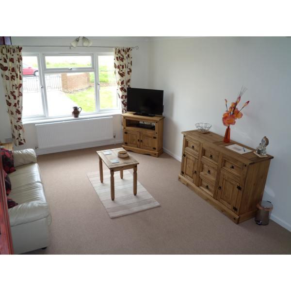 Newholme Cottage sitting room with television